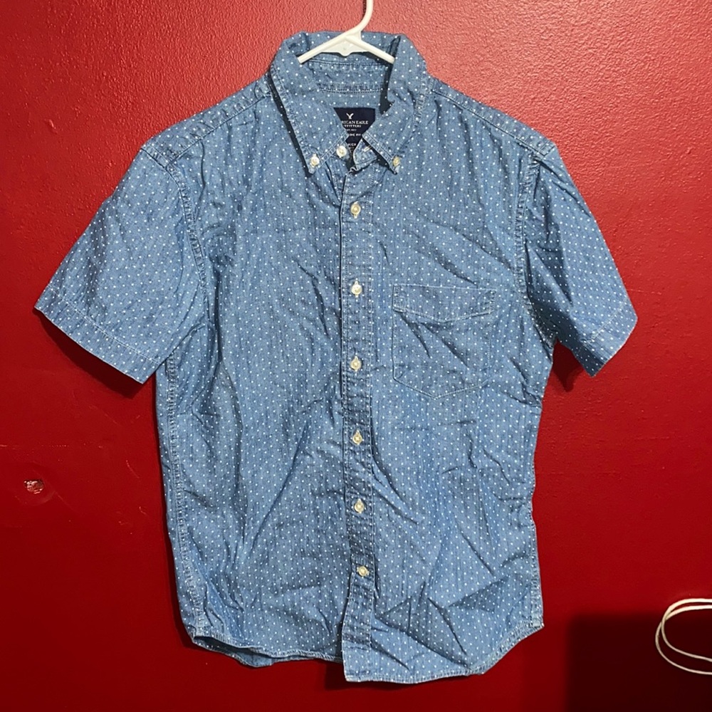 American Eagle, buttoned up dress shirt. Blue and white polka dot style.